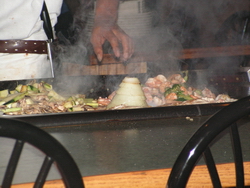 Dinner made fresh infront of you and a show to go along with it.